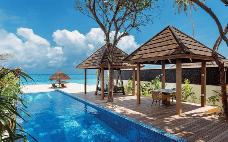 atmosphere kanifushi maldives villas kanifushi grand pool villa pool view 09 2021 v2