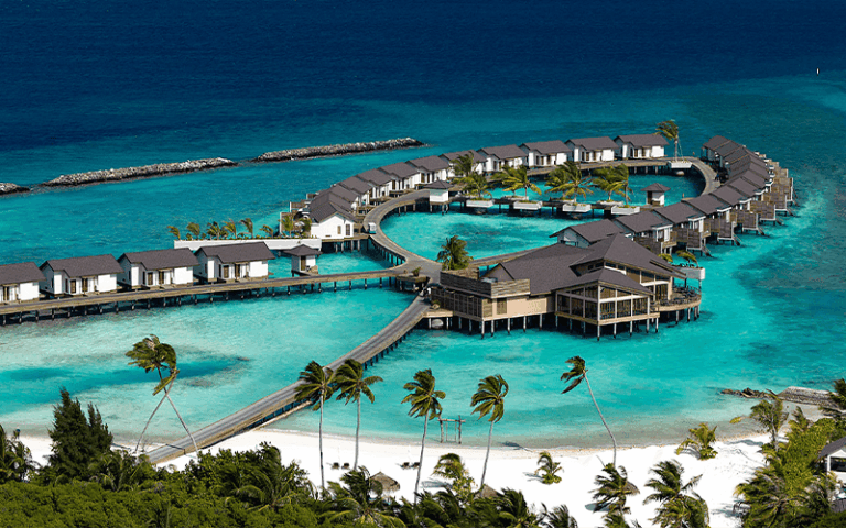 atmosphere kanifushi maldives water villa aerial v2