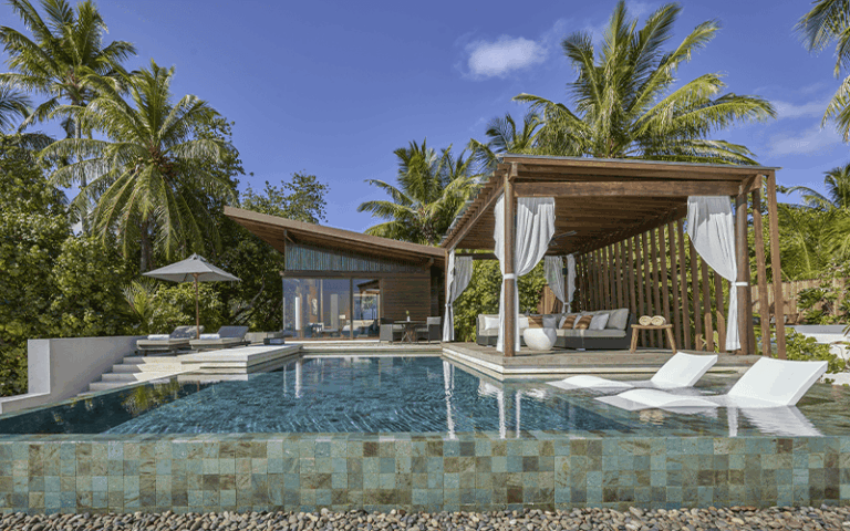 deluxe beach pool villa exterior compressed