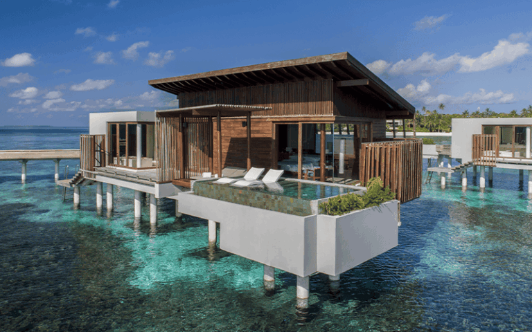 overwater sunset pool villa exterior front 2 compressed