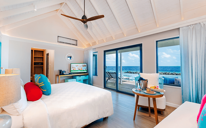 onhs honeymoon sunset water villa with pool bedroom interior 1 compressed