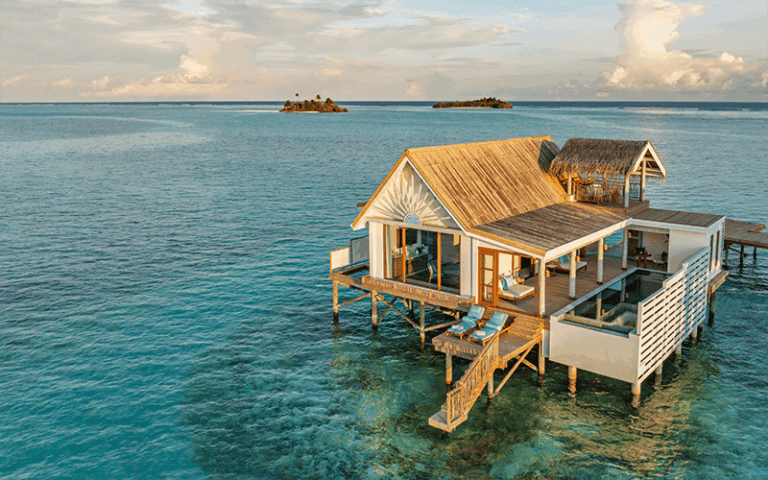 rah gili maldives water pool villa with slide aerial v2