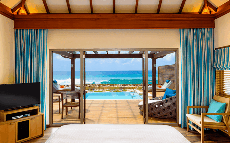 sheraton maldives full moon resort & spa ocean pool villa bedroom high 01 v2
