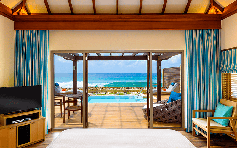 sheraton maldives full moon resort & spa ocean pool villa bedroom high 01 v2