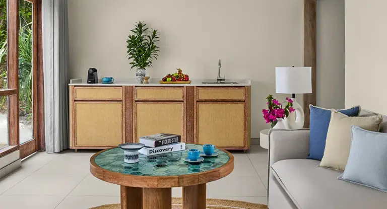 nh collection maldives reethi resort room two bedroom family pool villa living area 944x510