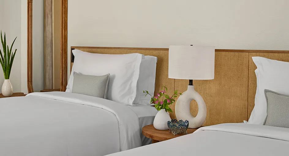 nh collection maldives reethi resort room two bedroom family pool villa twin bed 940x510