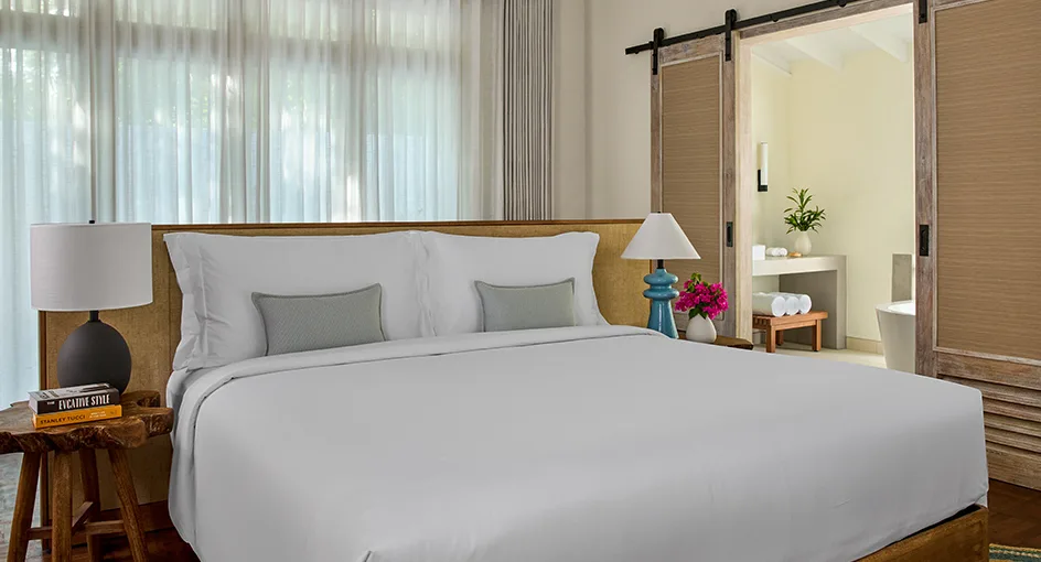 nh collection maldives reethi resort room two bedroom reethi suite master bedroom 944x510