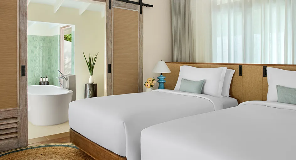 nh collection maldives reethi resort room two bedroom reethi suite twin bed 944x510
