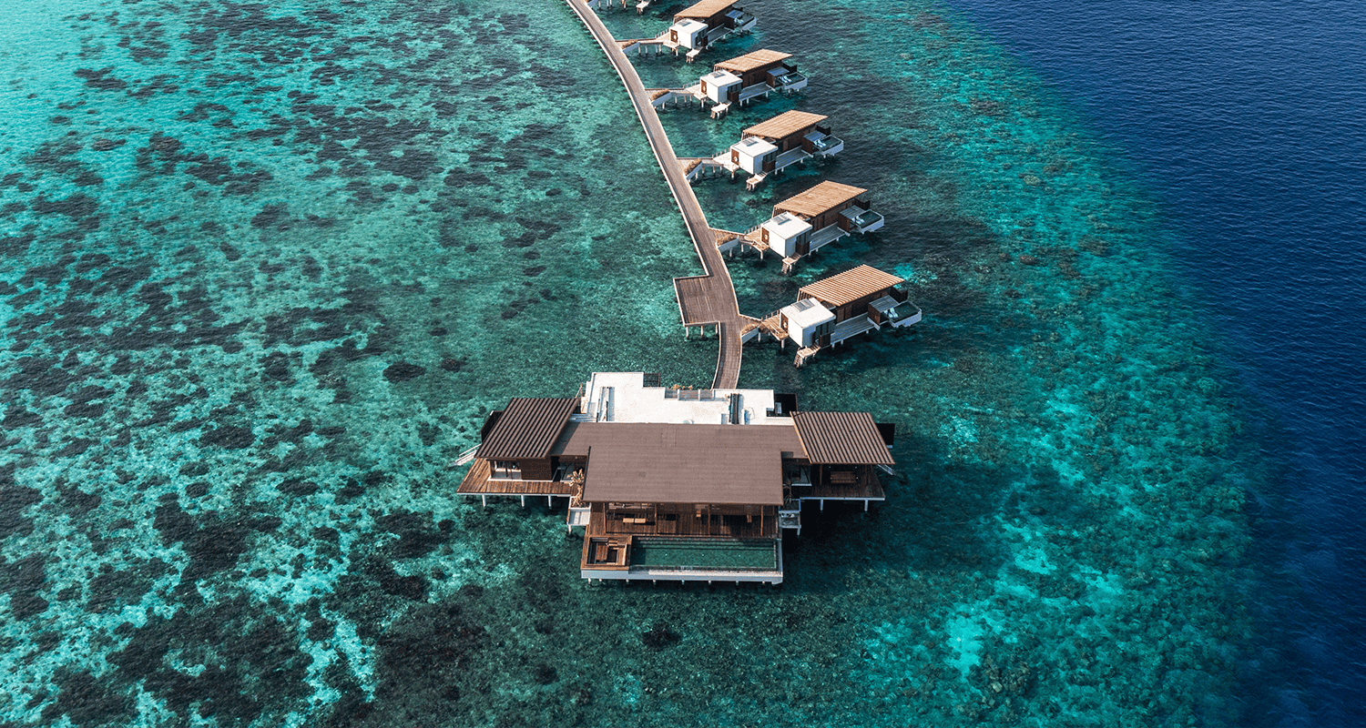 aerial view park hyatt maldives overwater reef residence compressed