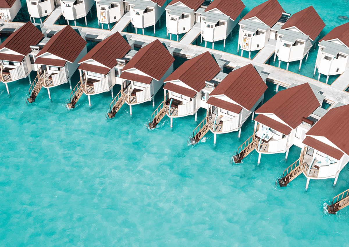 OBLU Xperience Ailafushi oblu xperience ailafushi aerials and generic water villas aerial 01 compressed