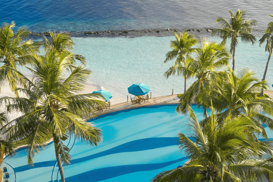 royal island main pool aerial view 4k compressed